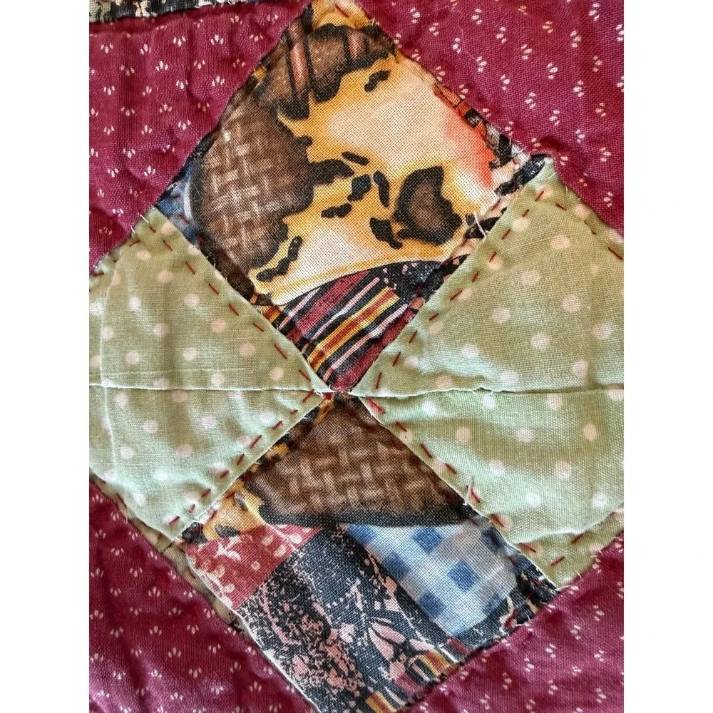 Small hand sewn quilt. Cutter